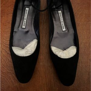 Black suede Manolo Blahnik flats with ankle strap